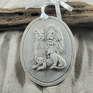 Lions, a male and female with two cubs handcrafted with real eand.