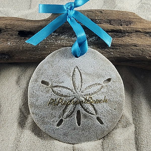 Point Pleasant gift idea.  Real sand is used to create this sand dollar ornament.  it is whitewashed, glittered and in the center are gold scripted lettering reading Point Pleasant.  Attached is a pretty turquoise bowed ribbon for hanging and a tag indicating that it is handcrafted with sand and made in the USA.