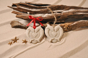 DOLPHINS HEART ORNAMENT, DOLPHINS, HEART, SAND ORNAMENT, TROPICAL SEASIDE ORNAMENT, COASTAL BEACH GIFT, MADE IN FLORIDA, BEACH LOVER GIFTS, BEACH SAND KEEPSAKES, VACATION SOUVENIR, GIFT SHOP OWNERS, PROMOTIONAL ITEMS, PARTY FAVOR, SPECIAL EVENT, COLLECTIBLES, HAND-CRAFTED, FUNDRAISER, BRIDAL SHOWER FAVORS, DESTINATION WEDDING, BEACH WEDDING FAVORS