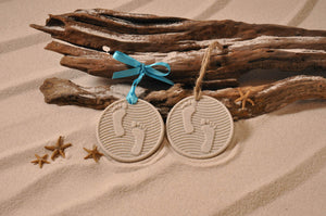 FOOTPRINTS, SAND FOOTPRINTS, ORNAMENT, SAND ORNAMENT, TROPICAL SEASIDE ORNAMENT, COASTAL BEACH GIFT, MADE IN FLORIDA, BEACH LOVER GIFTS, BEACH SAND KEEPSAKES, VACATION SOUVENIR, GIFT SHOP OWNERS, PROMOTIONAL ITEMS, PARTY FAVOR, SPECIAL EVENT, COLLECTIBLES, HAND-CRAFTED, FUNDRAISER, BRIDAL SHOWER FAVORS, DESTINATION WEDDING, BEACH WEDDING FAVORS