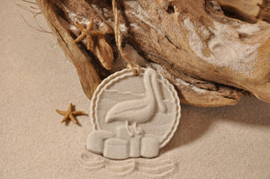 PELICAN ORNAMENT, PELICAN DOCK SAND ORNAMENT, TROPICAL SEASIDE ORNAMENT, COASTAL BEACH GIFT, MADE IN FLORIDA, BEACH LOVER GIFTS, BEACH SAND KEEPSAKES, VACATION SOUVENIR, GIFT SHOP OWNERS, PROMOTIONAL ITEMS, PARTY FAVOR, SPECIAL EVENT, COLLECTIBLES, HAND-CRAFTED, FUNDRAISER, BRIDAL SHOWER FAVORS, DESTINATION WEDDING, BEACH WEDDING FAVORS